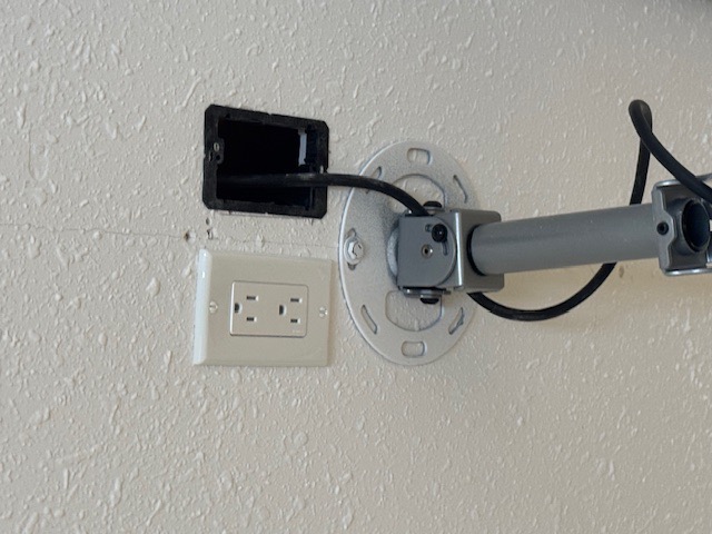 Custom outlet and ceiling-mounted junction box installation