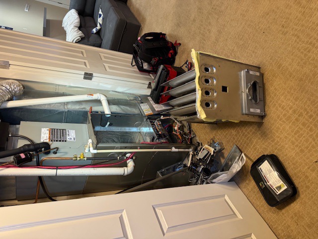 New high-efficiency furnace installation with custom ductwork