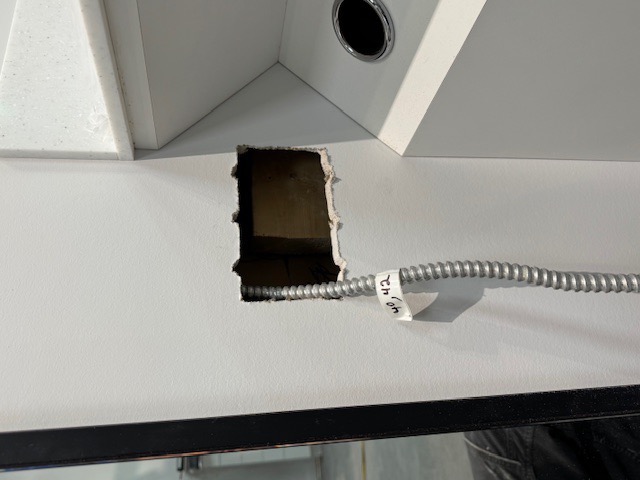 Armored conduit feed for a commercial circuit installation